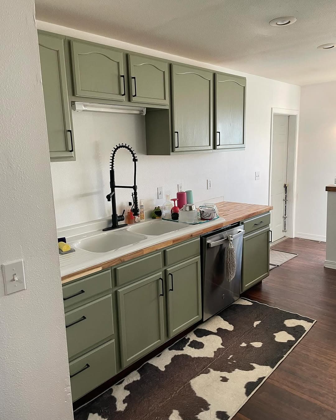 Oak kitchen updated in sage green